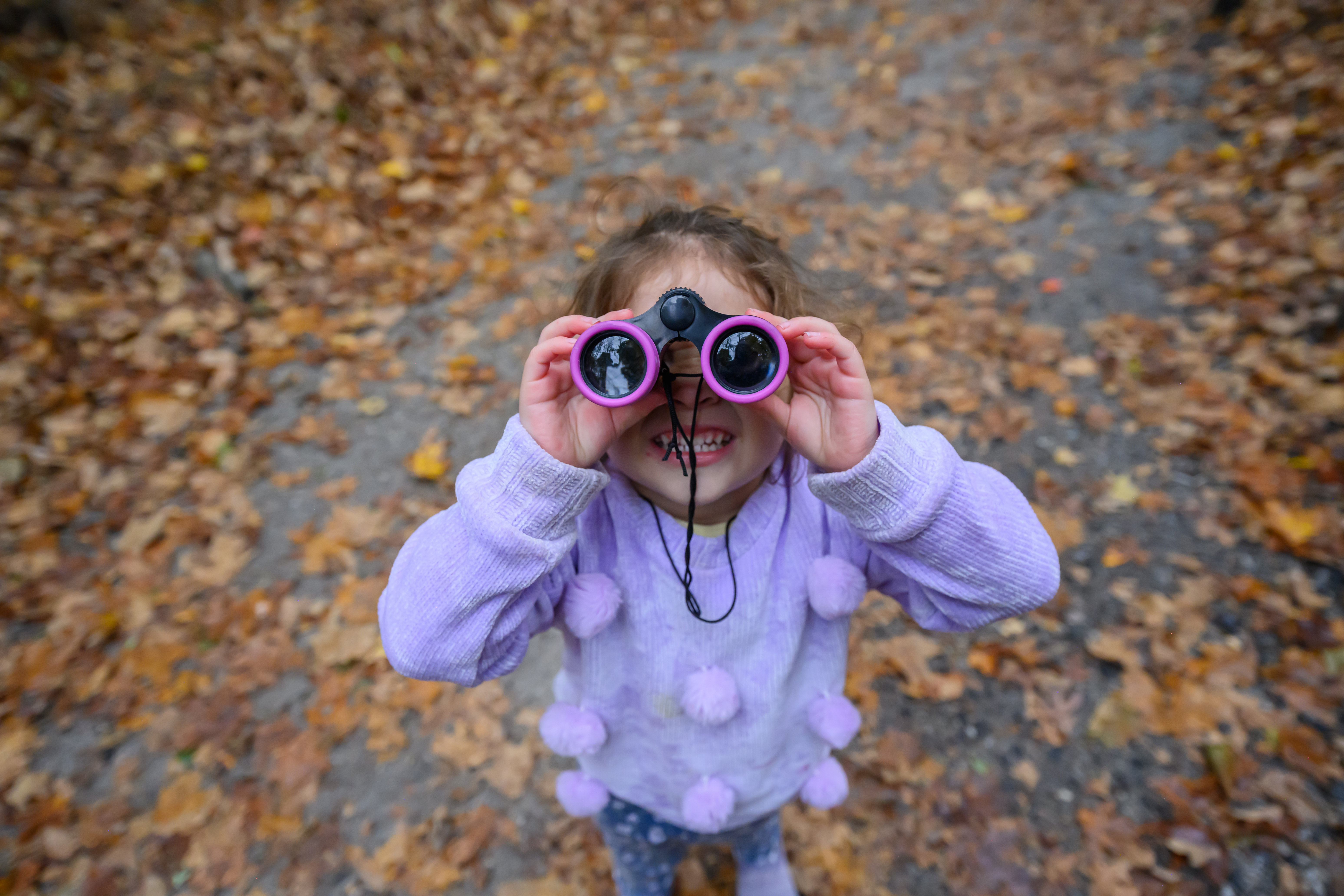 Girl with binoculars