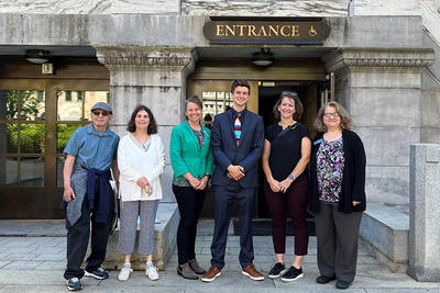Climate Champions in front of state house on Lobby Day.