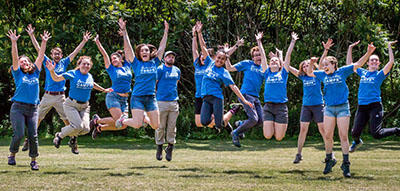 Arcadia Camp staff jumping up and down