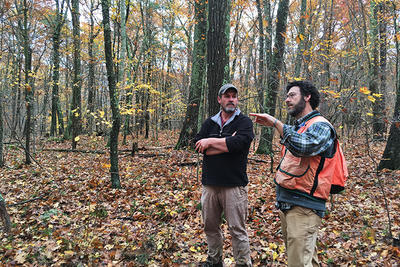 Foresters assessing a forest for a climate-smart forest management plan