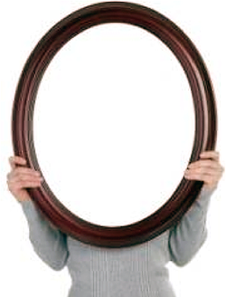 Mirror in front of a person's head.