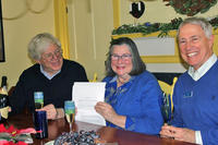 Reinier & Nancy Beeuwkes celebrate the deed signing with Gary Clayton