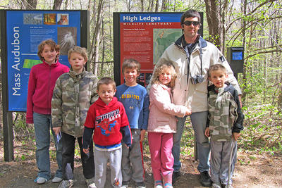 Family in front of main sign at High Ledges Wildlife Sanctuary © Jamie Scott