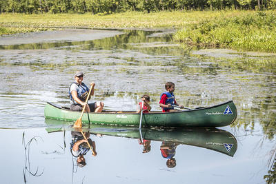 Family canoeing at Arcadia