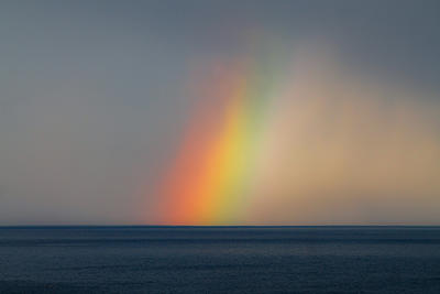 Rainbow over the water copyright Lily Tallent