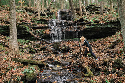 Boy hiking in fall in Sunderland, MA © Diana Chaplin