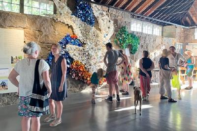Magazine Beach Tapestry by Michelle Lougee on display