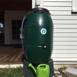 One of six rain barrels to capture roof runoff and reuse it on a dry day