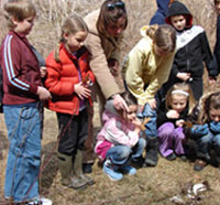 A group of students doing a program at Broadmoor Wildlife Sanctuary