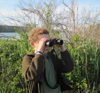 Boy with binoculars
