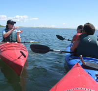An education program on the water at Felix Neck Wildlife Sanctuary