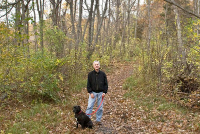 JRCF Eric with dog on trail