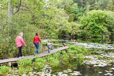 Family on the boardwalk at Ipswich River Wildlife Sanctuary © Charlie Reinertsen