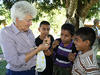 Woman showing kids a bird at Joppa Flats Education Center