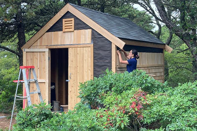 YES intern Sarah Swenson working on the new tool shed at Lost Farm Wildlife Sanctuary