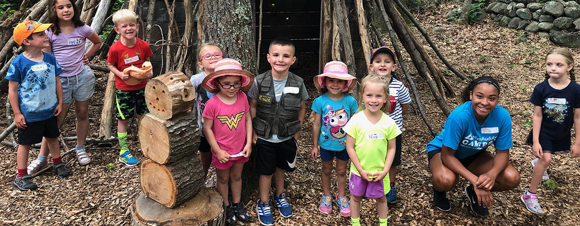 Discoverers campers in the Nature Play Area at Oak Knoll Wildlife Sanctuary