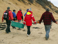 Adults participating in a field school program