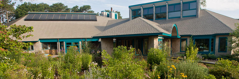 Exterior of WB Nature Center showing garden & solar panels