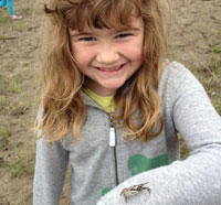 Girl with an insect on her arm