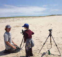Child birding on the beach with Wellfleet Bay Wildlife Sanctuary