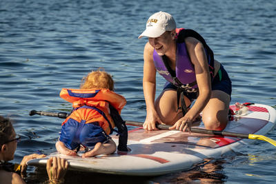 Stand-up Paddleboarding for the whole family at Wildwood's Family Camp