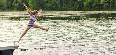 Leaping Off the Dock Into the Pond