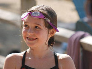 girl with swim goggles on