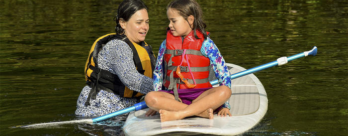 Mother & daughter doing SUP at Wildwood's Family Camp