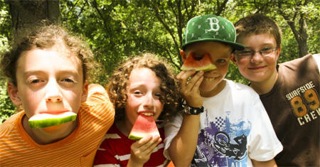 Arcadia campers eating watermelon