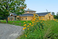 View of BNC from driveway in summer © Halvorson Design Partnership