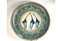Stoneware bowl with giraffe motif © Ann Schunior