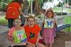 Two girls and a volunteer at Butterfly Festival © K Higgins Photography