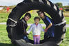 Kids inside giant tire at Farm Day © Abby Cirincione