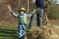 Small boy dressed as a scarecrow at Felix Neck's annual Fall Fest