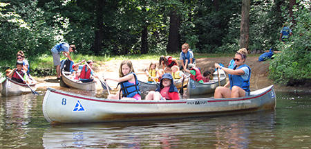 Campers canoeing at Ipswich River