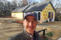 Sanctuary Director Ian Ives in front of the Discovery Center construction site