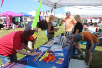 A small group gathered around a table