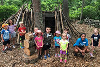 Discoverers campers in the Nature Play Area at Oak Knoll Wildlife Sanctuary