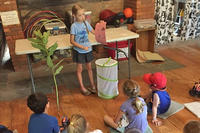 Amelia teaching her fellow Oak Knoll campers about Monarch butterflies