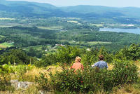 Two campers resting on a trail overlook at Pleasant Valley Wildlife Sanctuary