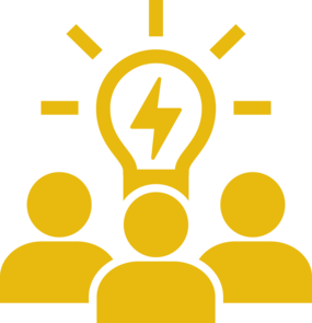 Silhouette of a group under a light bulb
