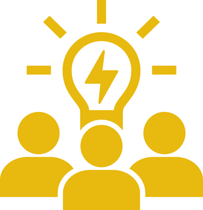 Silhouette of a group under a light bulb