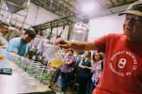 Pouring beer at Aeronaut Brewery