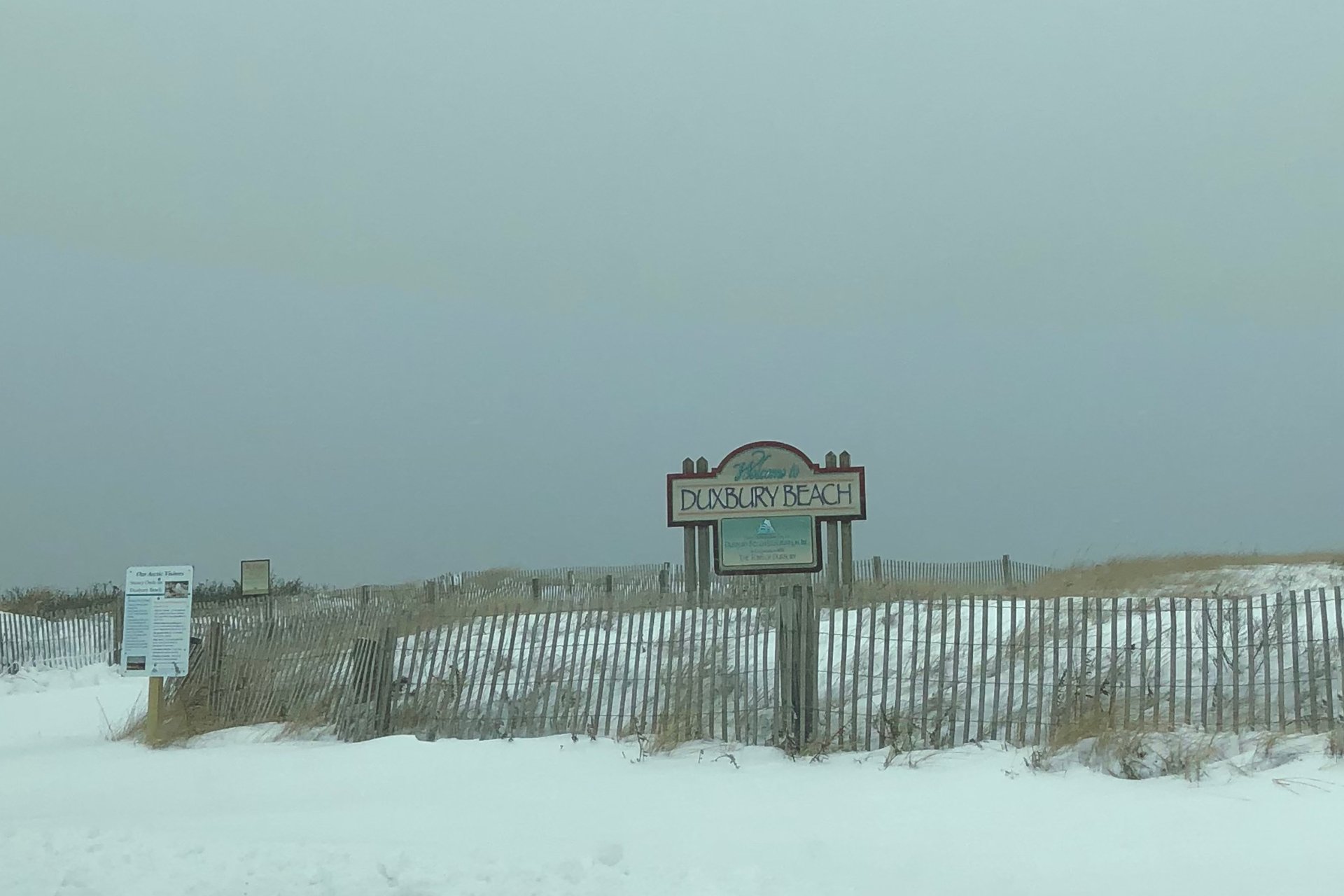 Duxbury Beach sign in winter