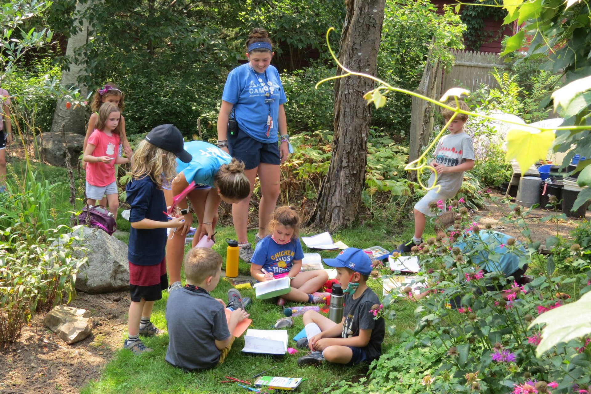 Camp counselors leading a group activity