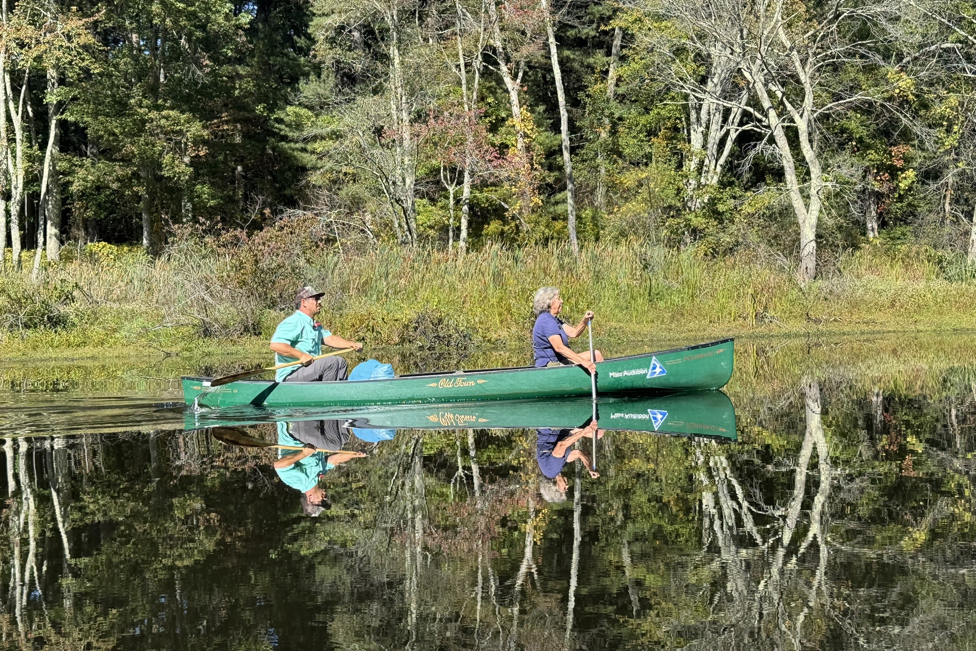 Waban Webquish and Broadmoor's Community Engagement Manager Elissa Landre scouting the route for a future canoe program on the Charles River
