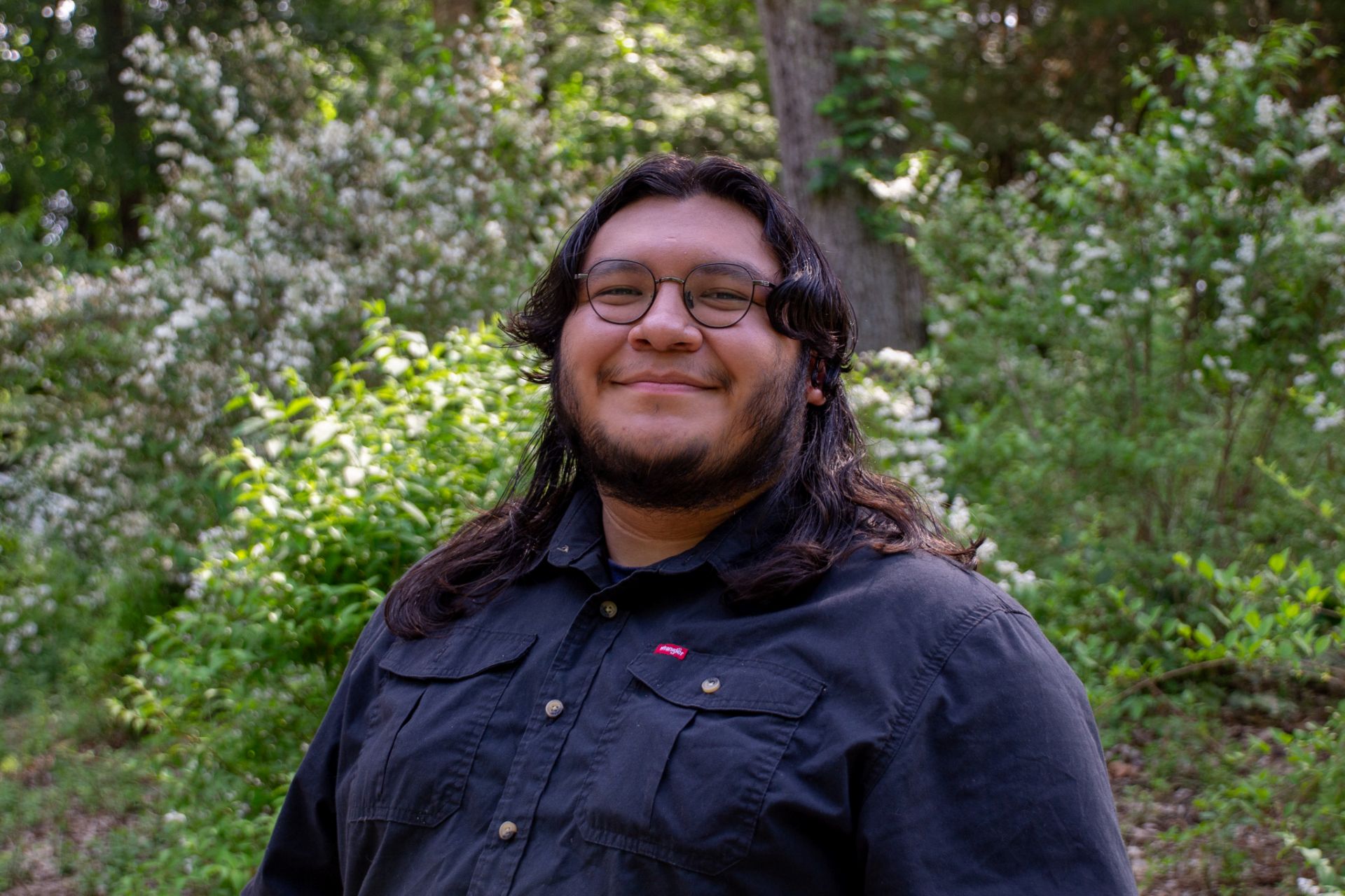 Angel Del Valle Cardenas smiling outside
