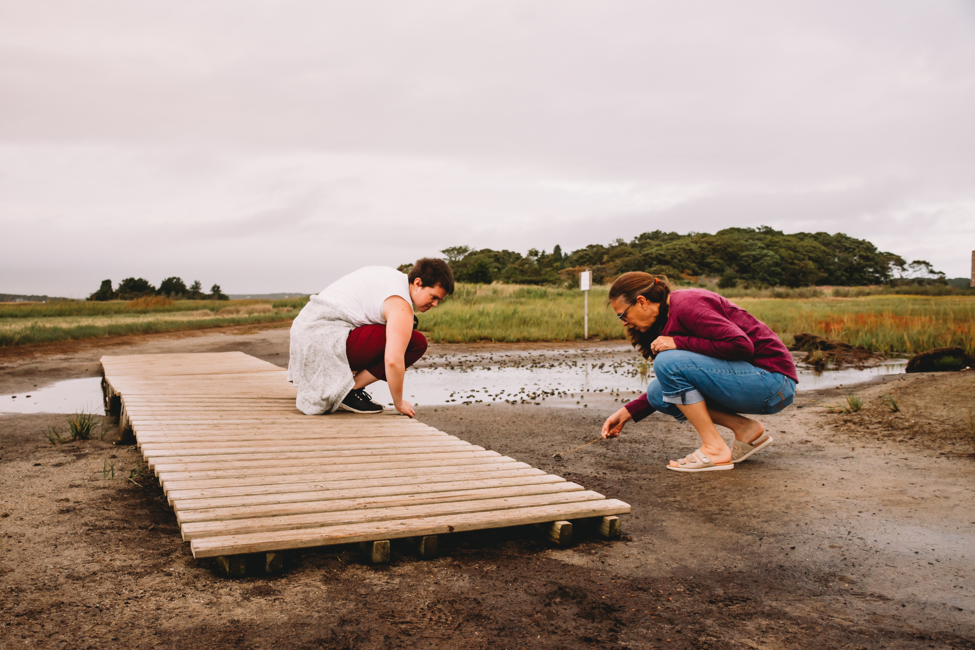 Two people on boardwalk at Wellfleet Bay