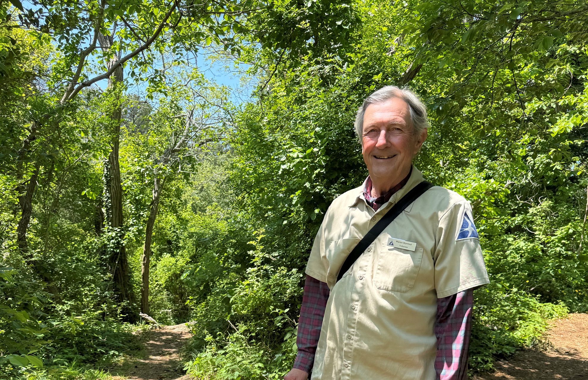 Wellfleet Bay volunteer Warren Mumford on a trail