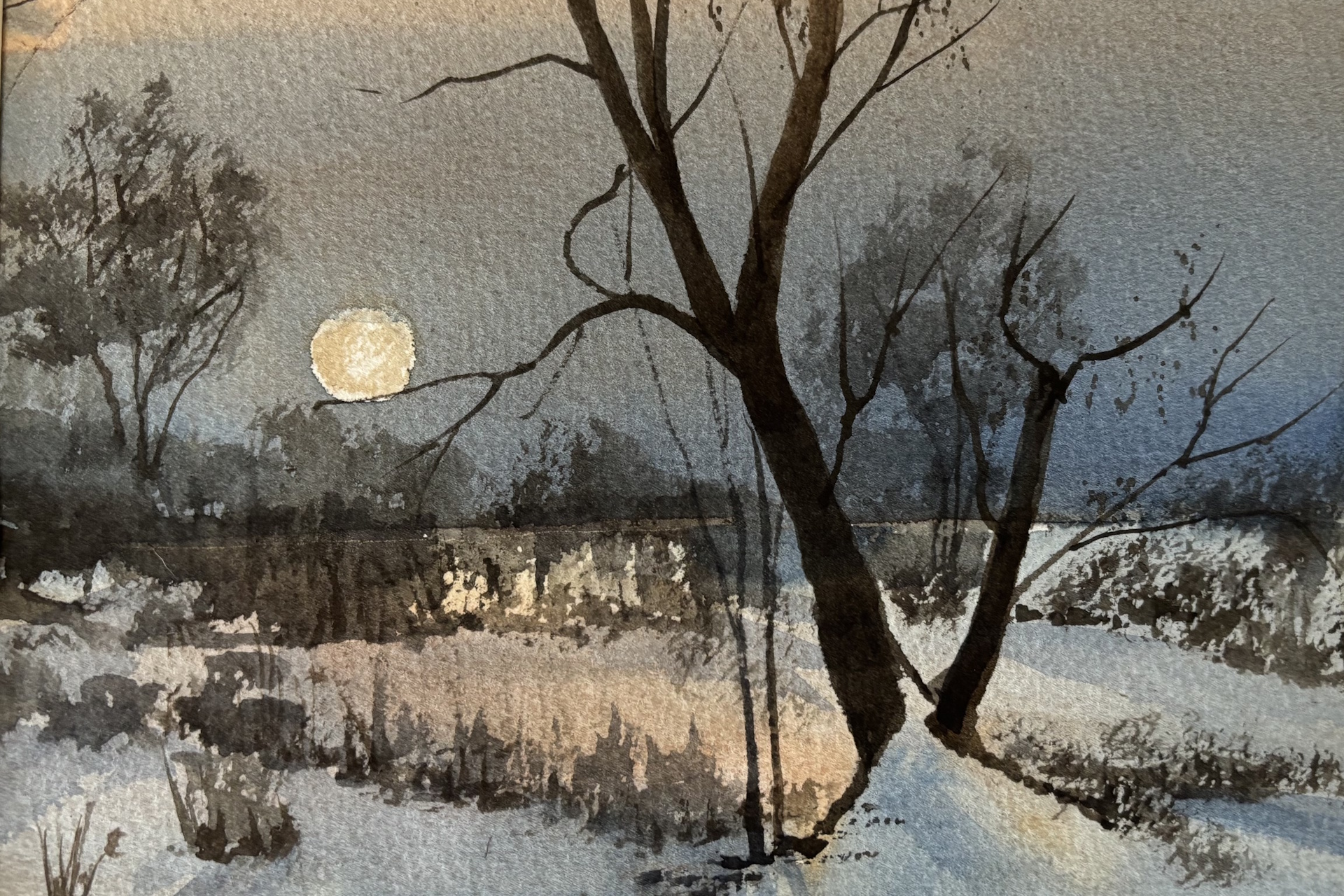 Watercolor landscape featuring a barren tree and the moon done in muted blue hues